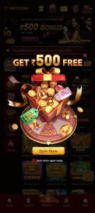 HV7.COM app ka interface jisme red gift box, coins aur "Get ₹500 Free" spin wheel dikh raha hai.
